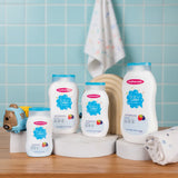 Mothercare Baby Lotion French Berries Collection From Small to Family Sizes placed on a platform with kids toys and clothing in a kids bathroom
